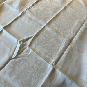 Antique linen napkins and square tablecloth